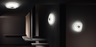Itama Smoke wall and ceiling light with a sleek, smoky glass shade, designed for modern interior lighting.