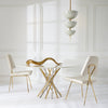 Brass giant horn sculpture by Jonathan Adler, a stylish accessories piece with a shiny, curved design.