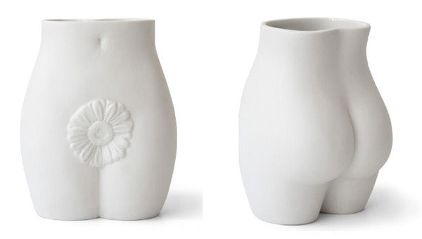 Jonathan Adler Edie Vase, a stylish decorative accessory with a sleek design, perfect for enhancing home décor.
