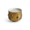 Jonathan Adler Muse D'Or ceramic candle accessory with a sleek, modern design and elegant gold accents.