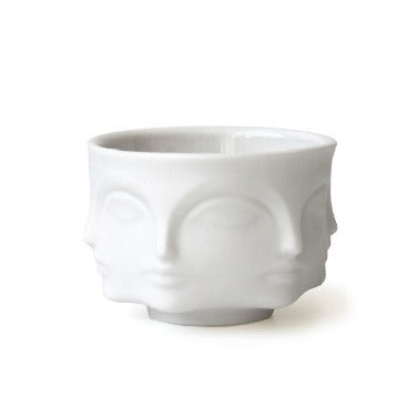 Jonathan Adler Muse votive candle holder with modern glass design, perfect as an accessory or decorative piece.