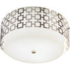 Jonathan Adler Parker Flush Mount lighting fixture in antique brass with sleek, modern design and round shape.