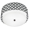 Jonathan Adler Parker flush mount lighting fixture in antique brass, showcasing a sleek, modern ceiling light design.