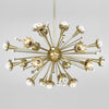 Small antique brass Sputnik chandelier by Jonathan Adler showcasing multiple light bulbs and a modern, starburst-inspired design.