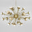 Small antique brass Sputnik chandelier by Jonathan Adler showcasing multiple light bulbs and a modern, starburst-inspired design.