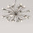 Small antique brass Sputnik chandelier by Jonathan Adler, modern lighting fixture with multiple arms and globe bulbs.