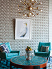 Small antique brass Sputnik chandelier by Jonathan Adler, featuring multiple light arms and modern lighting design.