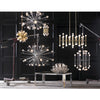Jonathan Adler Meurice Chandelier in brass, elegant lighting fixture with modern design and intricate details.