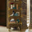 Brass Jacques Etagere storage unit by Jonathan Adler with multiple open shelves for stylish organization.