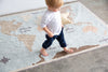 Kids' vintage map washable rug by Lorena Canals featuring colorful map design and soft, durable fabric for playful spaces.