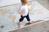 Kids' vintage map washable rug by Lorena Canals featuring colorful map design and soft, durable fabric for playful spaces.