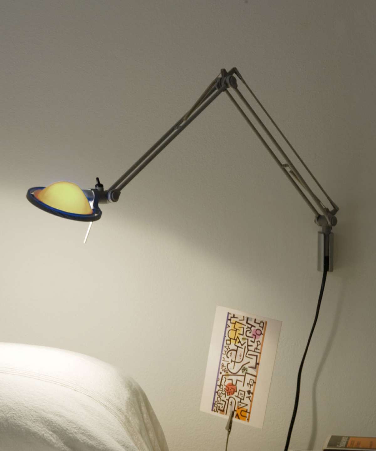 Luceplan Berenice wall lamp in sleek aluminum, modern lighting fixture mounted on wall with soft illumination