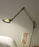 Luceplan Berenice wall lamp in sleek aluminum, modern lighting fixture mounted on wall with soft illumination