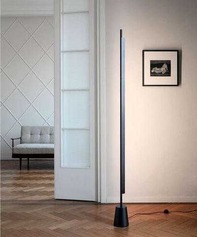Luceplan Compendium Floor Lamp with aluminum finish and adjustable arm, providing stylish lighting for modern interiors.