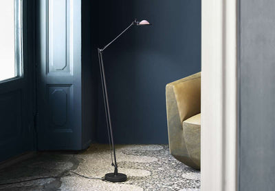 Luceplan Berenice floor lamp with sleek aluminum design, modern lighting fixture standing on a flat surface.