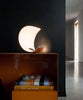 Luceplan Curl Table lighting with sleek, curved design and modern aesthetic, ideal for contemporary interior decor.