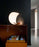 Luceplan Curl Table lighting with sleek, curved design and modern aesthetic, ideal for contemporary interior decor.