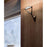 Luceplan Lola Wall Lamp, modern lighting fixture with sleek design, mounted on a wall in a contemporary interior setting.