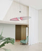 Pink Queen Titania Suspension Lamp by Luceplan, modern lighting fixture with a sleek design, hangs from the ceiling.