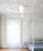 Luceplan Blow ceiling fan, transparent lighting fixture with sleek modern design, mounted on ceiling, energy-efficient lighting and air circulation.