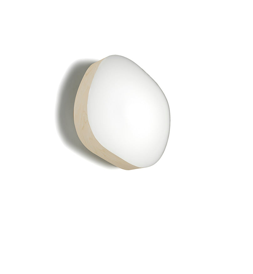 Large Guijarro wall and ceiling light by LZF Lighting with natural cherry wood finish, showcasing its modern, organic design.