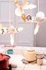 Moooi Cluster Suspension Lamp hanging fixture with multiple glass bulbs, modern lighting design for contemporary interiors