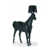 Moooi Horse Floor Lamp featuring a sculptural horse-shaped design in modern lighting style, placed on a wooden floor.