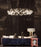 Copper Heracleum III The Big O by Moooi lighting fixture with multiple branching arms and illuminated bulbs.