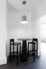 White container table foot by Moooi, modern table support with sleek design, suitable for contemporary furniture.