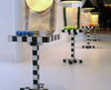 Chess table by Moooi featuring a modern design with a black and white checkered surface and sleek wooden legs.
