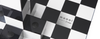 Chess table by Moooi featuring a sleek, modern design with a checkered surface and stylish wooden legs.