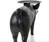 Pig Side Table by Moooi, a modern decorative table with a pig-shaped design, showcasing smooth curves and stylish craftsmanship.