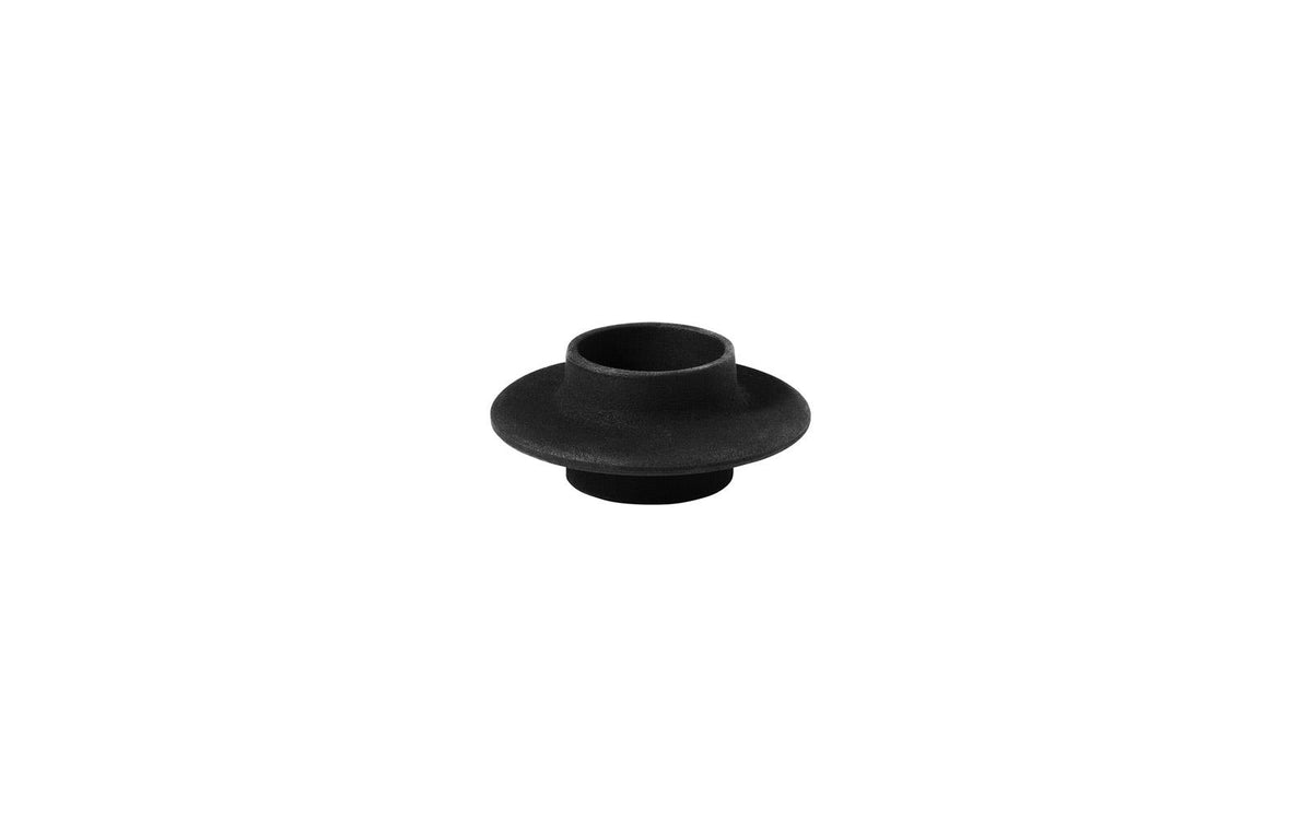 Heima Tealight Holder by Normann Copenhagen, modern ceramic accessory with a minimalist design, perfect for ambient lighting.