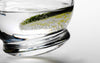 Normann Copenhagen rocking glass accessory with clear glass and rounded base, designed for stylish drinking experiences.