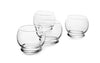 Normann Copenhagen rocking glass, clear glass accessory with a curved design, perfect for stylish beverages.