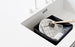 Washing-up brush by Normann Copenhagen, a stylish kitchen accessory with a wooden handle and durable bristles.