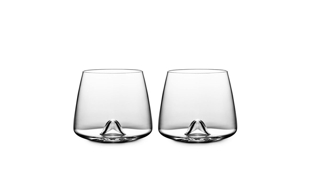 Elegant whiskey glass by Normann Copenhagen, showcasing clear glass design for enjoying spirits in style.
