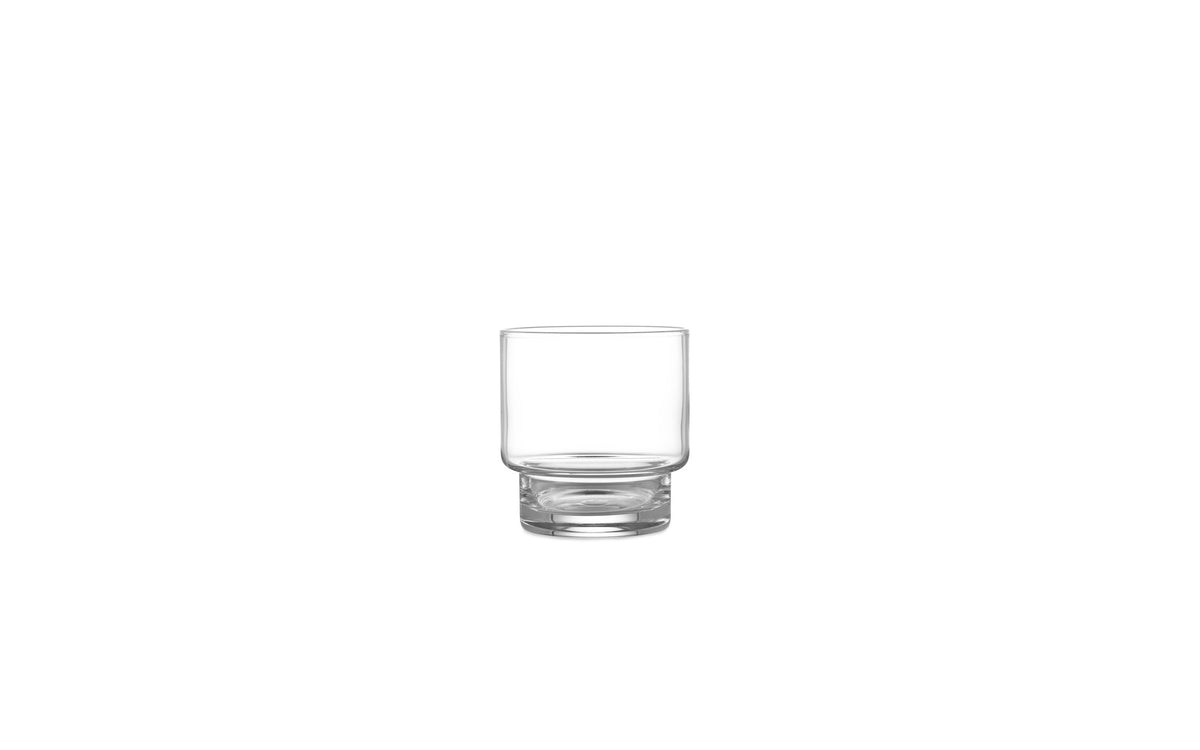 Small clear Fit Glass accessory from Normann Copenhagen's accessories series, featuring a modern minimalist design.