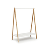 Small white Toj clothes rack by Normann Copenhagen, modern accessories for organizing clothing in a stylish space.