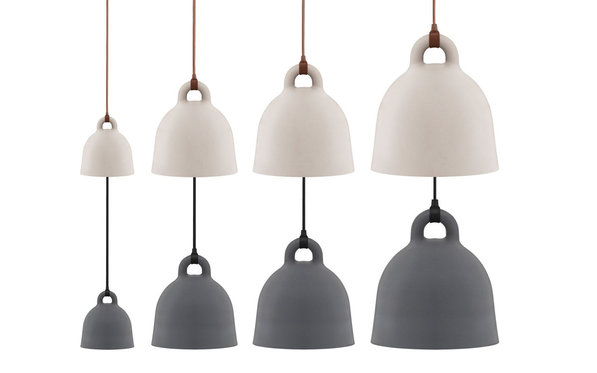 Small sand-colored Bell Lamp by Normann Copenhagen, modern lighting fixture with a smooth, rounded design and minimalist style.