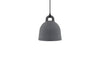Small sand-colored Bell Lamp by Normann Copenhagen, stylish lighting fixture with a smooth, curved design.