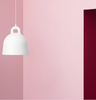 Small Sand Bell Lamp by Normann Copenhagen, modern lighting fixture with a sleek, minimalist design and smooth surface.