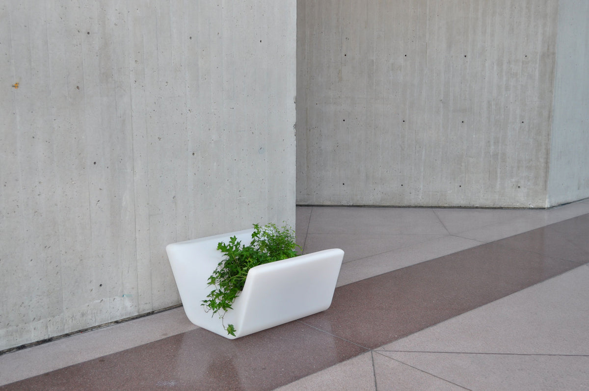 Red Otto Ottoman by Offi, versatile seating bench with integrated planter, modern design, suitable for indoor or outdoor use.