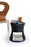 White Tiki Stool by Offi, modern seating with a sleek, sculptural design perfect for contemporary interiors.
