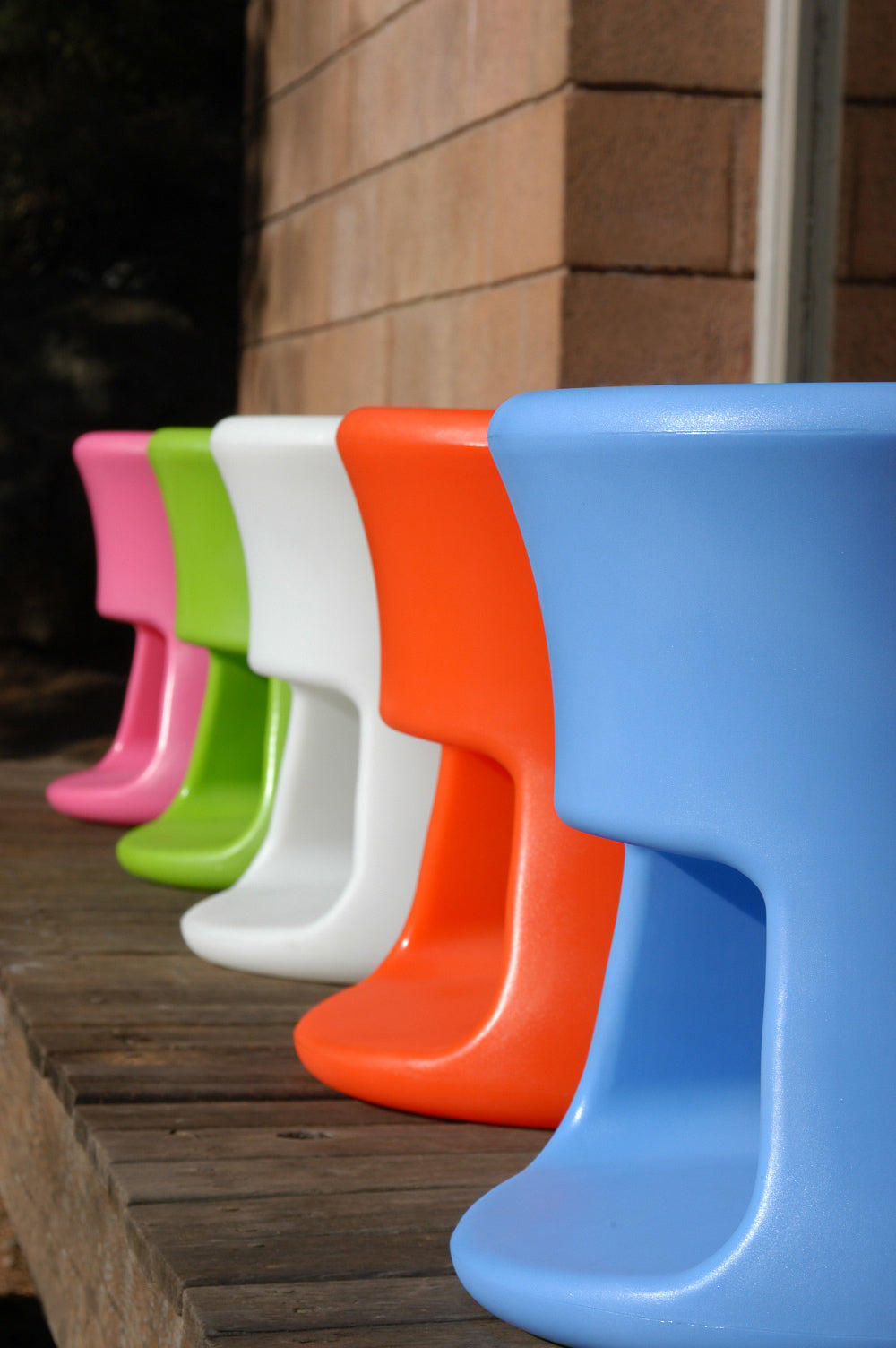 White Tiki Stool by Offi, modern seating with a smooth, rounded design, ideal for contemporary home or office decor.