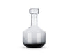 Black Tank Whiskey Decanter by Tom Dixon, stylish glass accessory for storing and serving whiskey in a modern design.