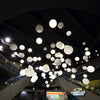 Small Globo suspension light by VISO, Canadian-made lighting fixture with a sleek, modern design.