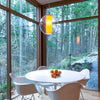 Small white VISO Ilu Suspension lighting fixture with clear glass shade, made in Canada.