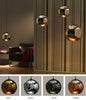 Small silver Fort Knox Suspension lighting fixture by Viso, Canadian-made, featuring modern design and sleek metallic finish.