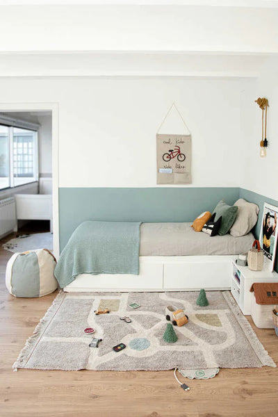 EcoCity washable rug by Lorena Canals, bedroom decor with vibrant geometric patterns and soft, durable fabric.